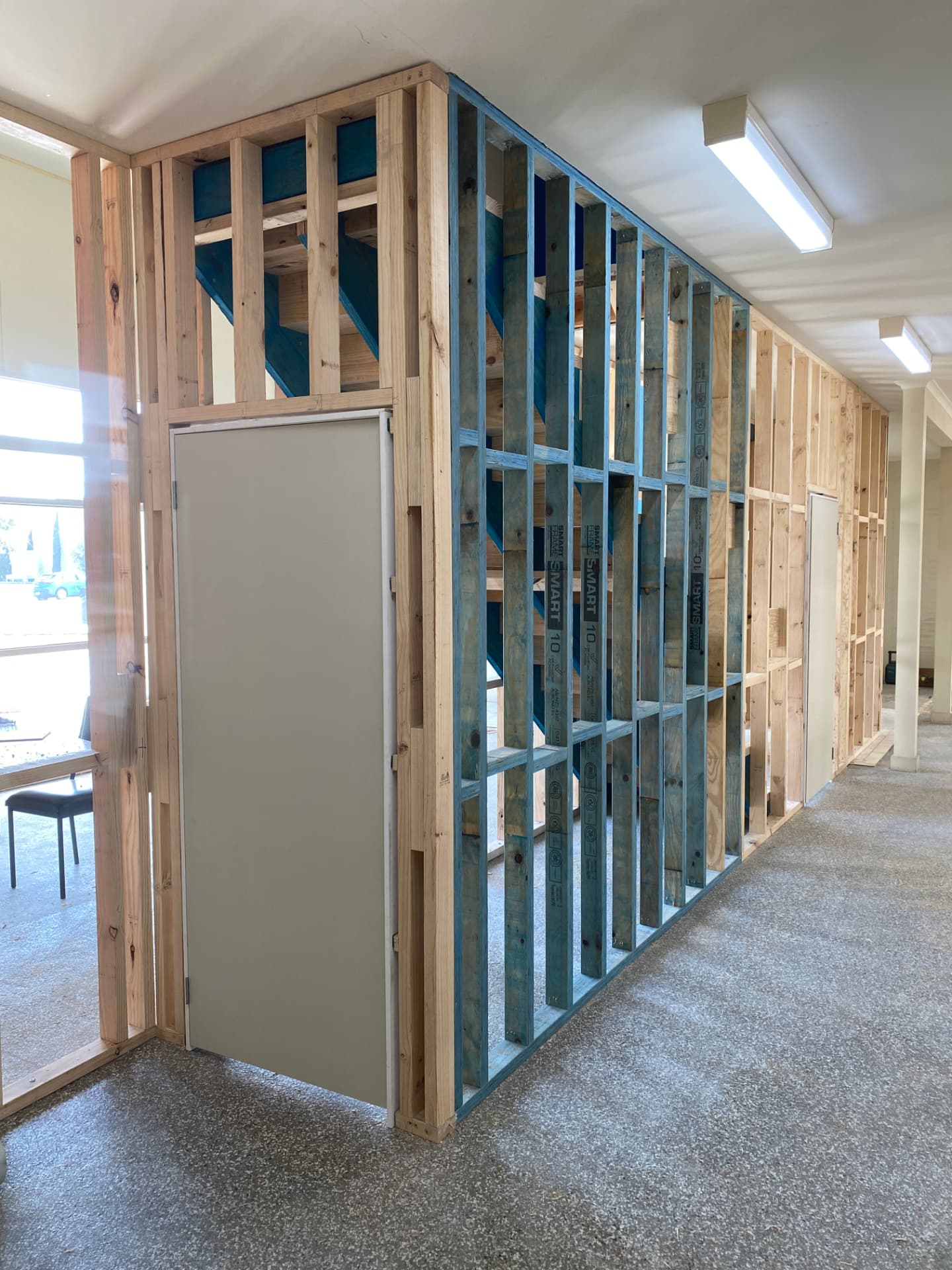 Stairwell framing with new door and wall linings