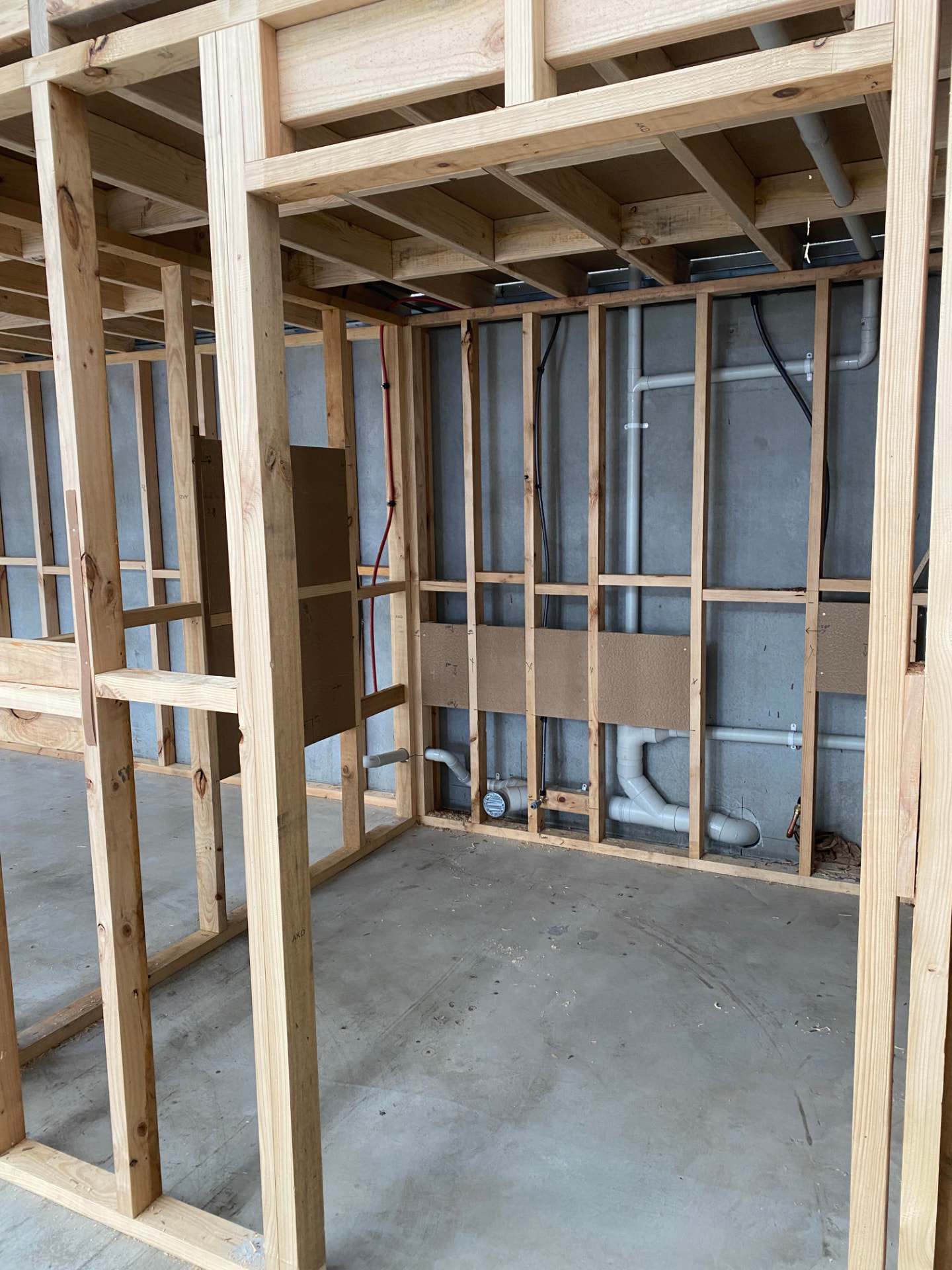 Internal framing with plumbing and electrical rough-in