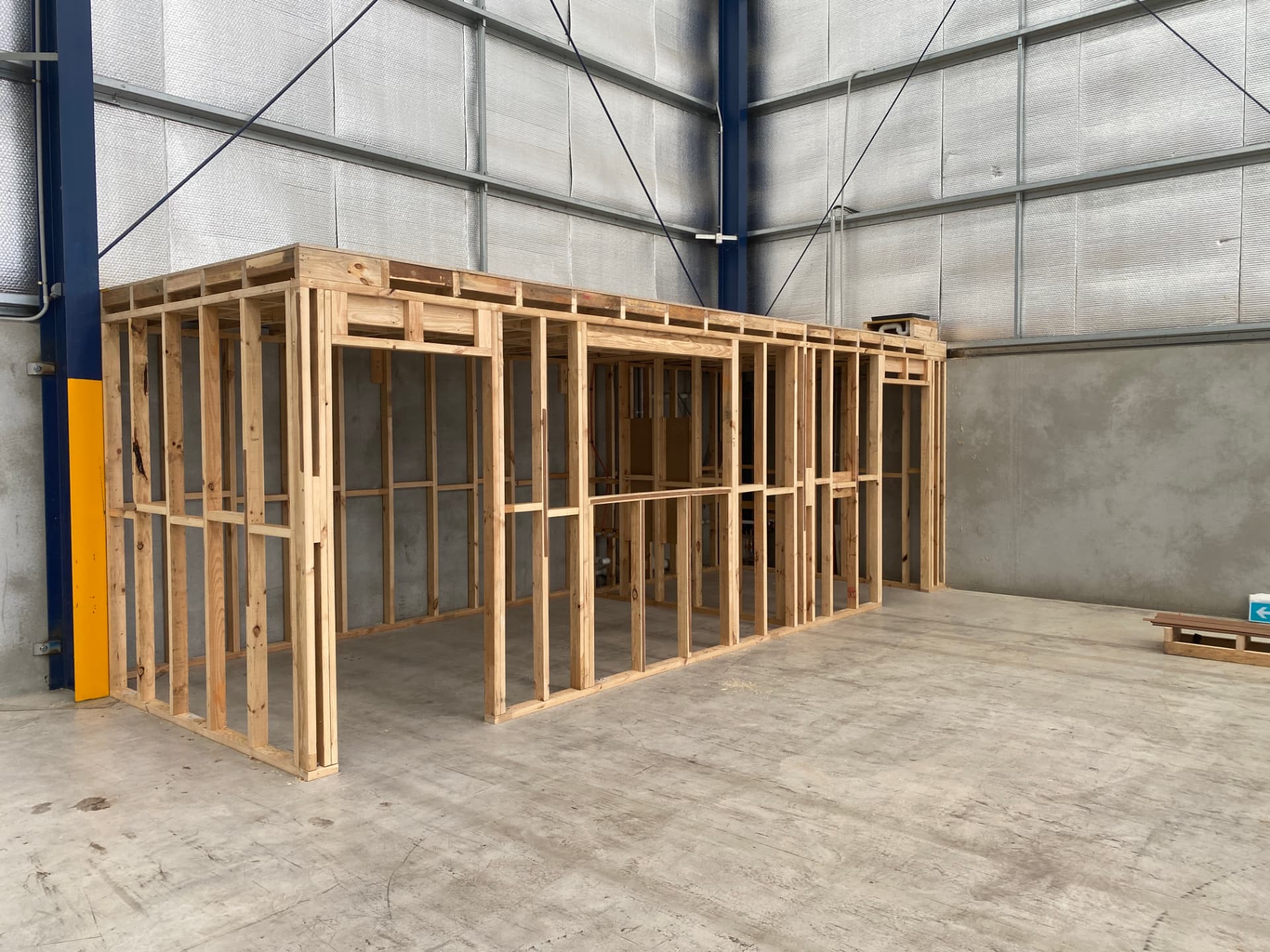 Completed timber frame for disabled access toilet and lunchroom inside warehouse